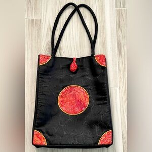 Black and Red Tote Bag with Asian-Inspired Medallion